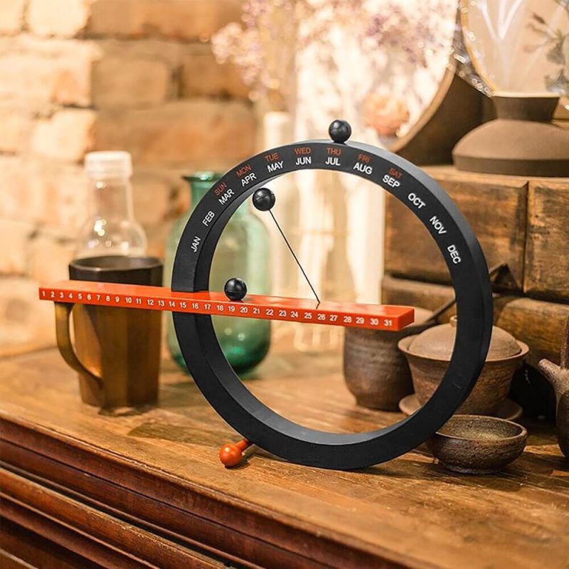 horloge calendrier perpetuel magnetique noir