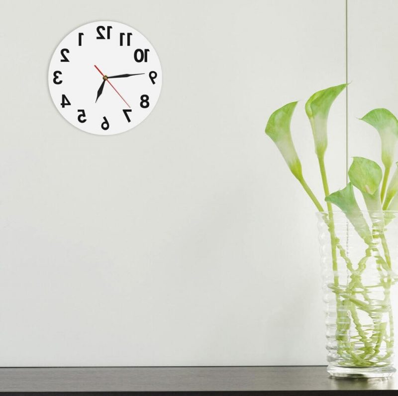 horloge inversee design murale blanche
