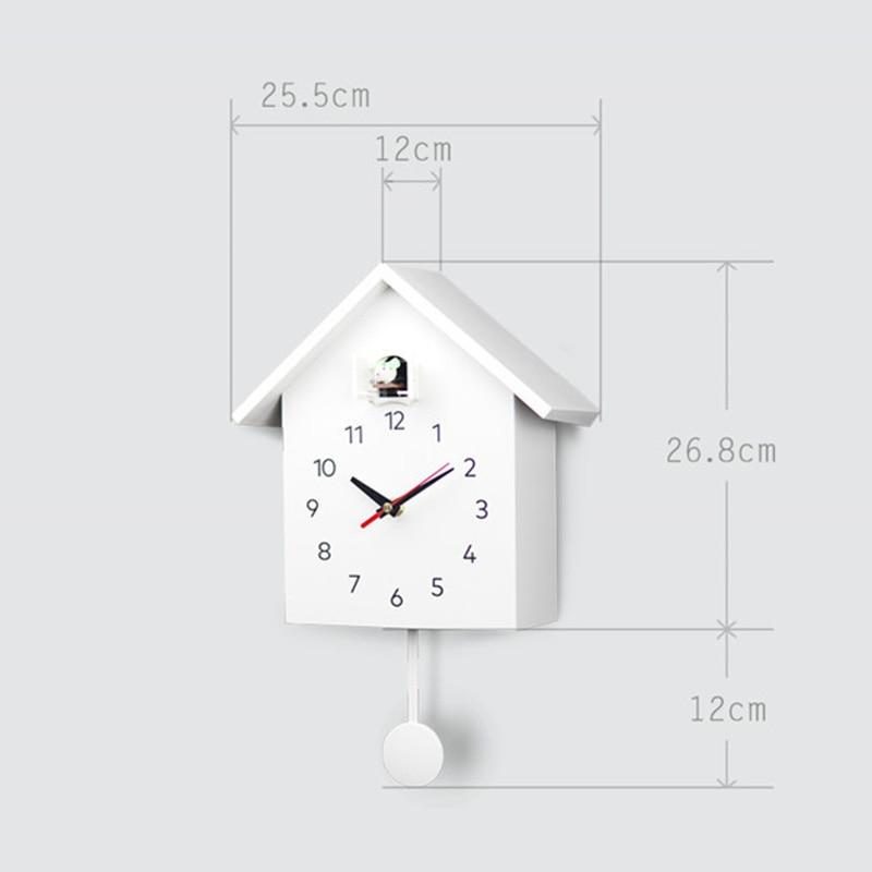 horloge_murale_coucou_scandinave_quartz_oiseau_design_blanc_forest_suisse_diametre_25cmx26cm
