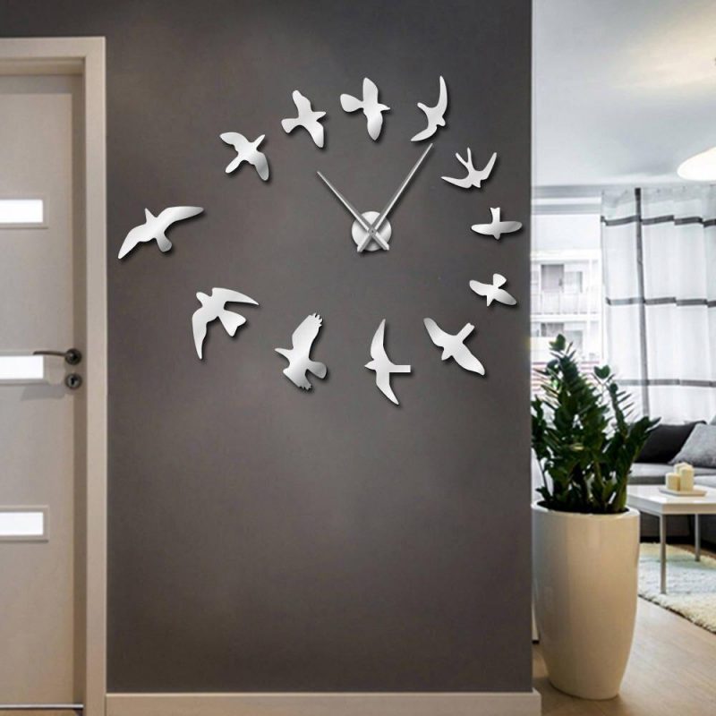 horloge murale design hirondelles