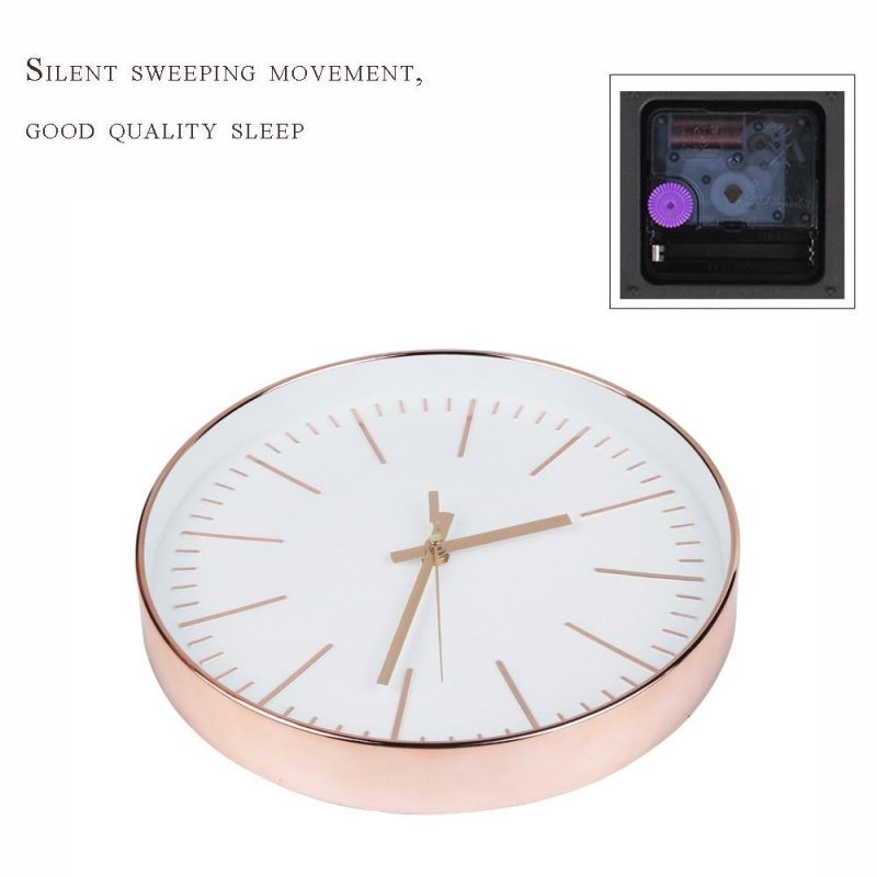 horloge murale design rose gold moderne