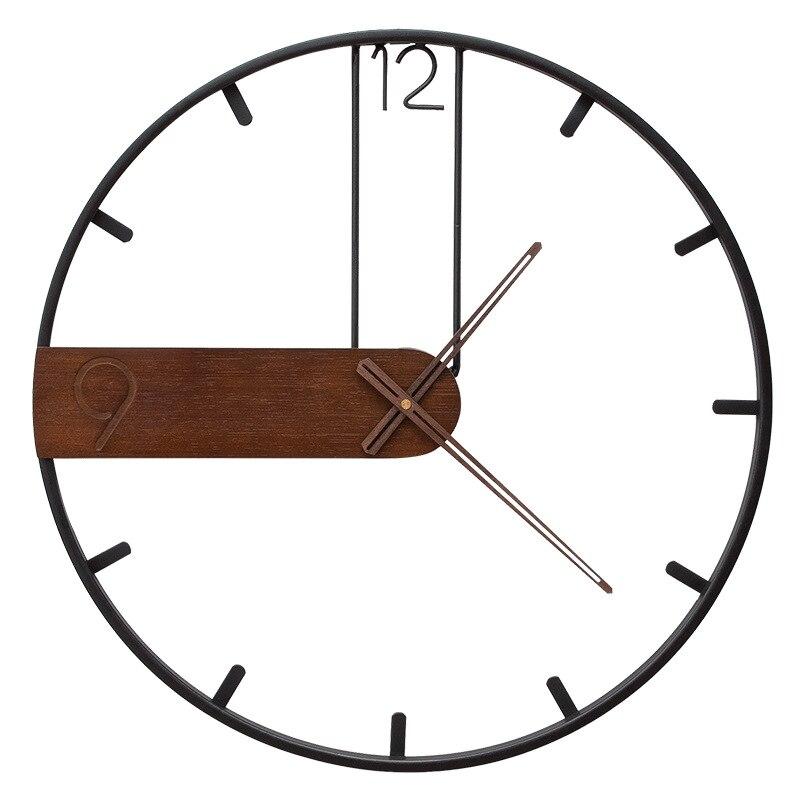 horloge murale scandinave en metal noir nordique minimalsite decoration design