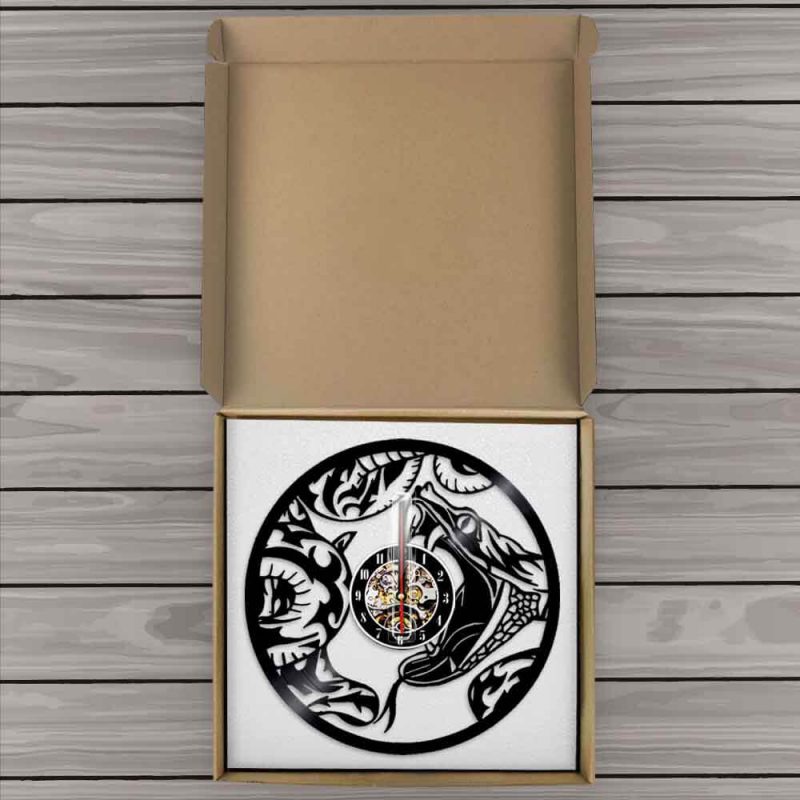 horloge murale vinyle serpent boite colis